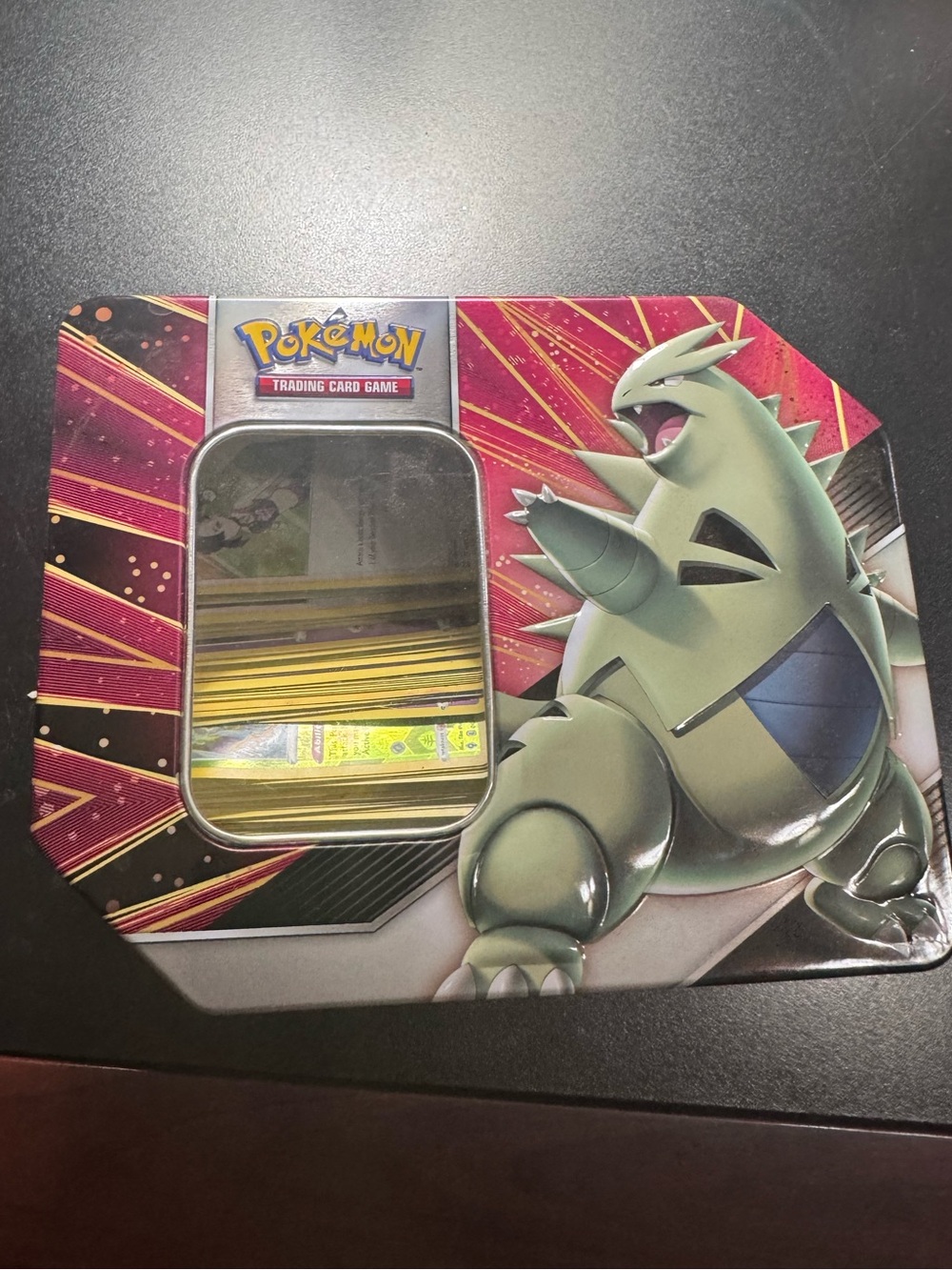 Pokemon Tin with Green Tyranitar Artwork and Pink Accents
